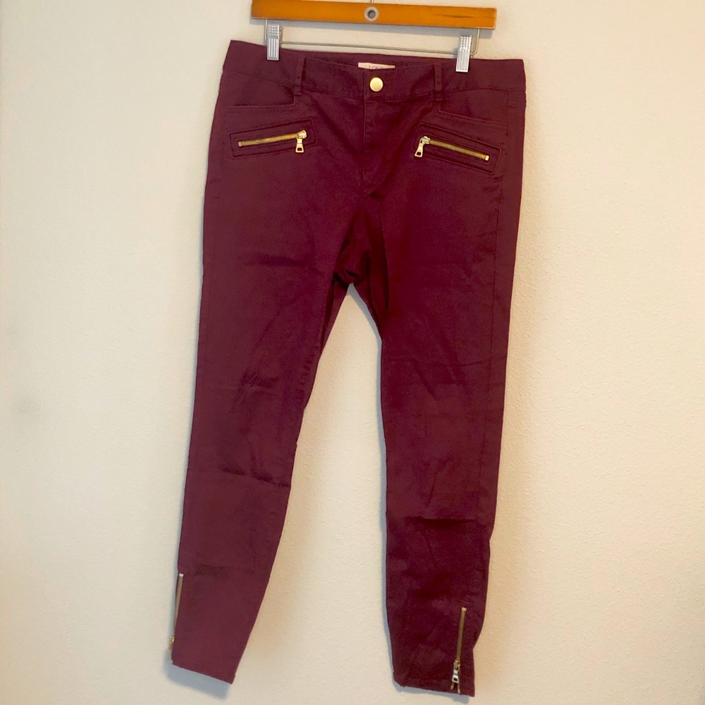 Burgundy skinny ankle-zip pants